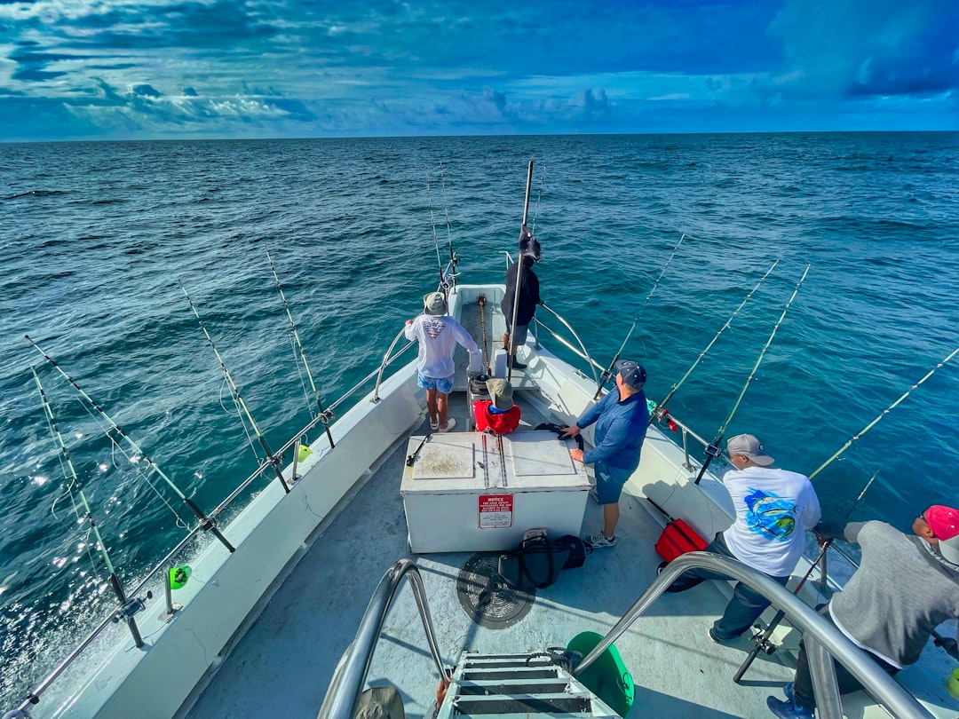 Captain Stacy head boat heading out offshore in the Atlantic Ocean for a day-long fishing trip.